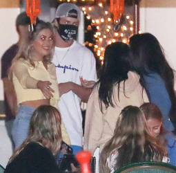 Kourtney Kardashian 41 and her TikTok star BFF Addison Rae 19 wear matching hoodies for dinner in Malibu