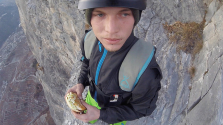 HAMBURGER AND FLIES HILARIOUS MOMENT BASE JUMPER OFF OFF THE SIDE OF A CLIFF WHILE EATING HIS LUNCH with video 
