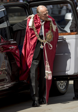 Queen Elizabeth II and Prince Philip Duke of Edinburgh attend a service to mark the 100th anniversary of the Order of the British Empire at St Paul s Cathedral in London.