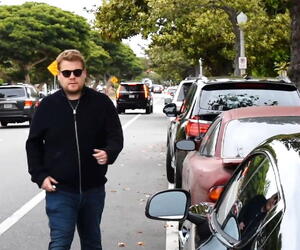 James Corden was spotted in Brentwood climbing into his Aston Martin Rapide sportscar.
