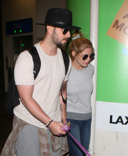 Ashley Greene and fiance take their dog on a plane