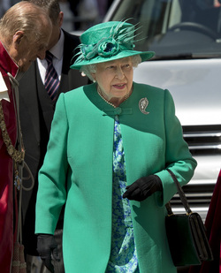 Queen Elizabeth II and Prince Philip Duke of Edinburgh attend a service to mark the 100th anniversary of the Order of the British Empire at St Paul s Cathedral in London.