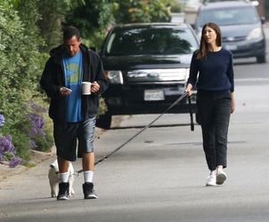 Adam Sandler walking his cute puppy Adam Sandler walking his cute puppy