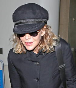 Meg Ryan Tries To Keep A Low Profile Arriving In L.A. After CFDA Awards
