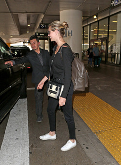 Kate Upton Goes Casual In All Black At LAX