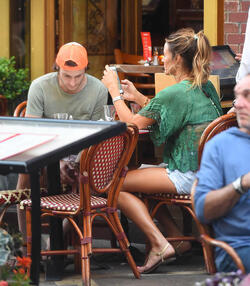 Kelly Bensimon pushing her Citi Biki and going for lunch in short shorts