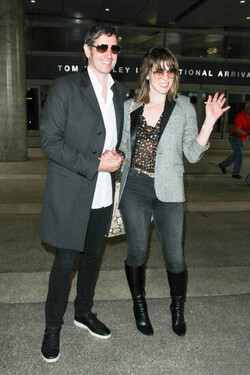 Milla Jovovich and Paul Anderson pictured at Los Angeles International Airport Milla Jovovich and Paul Anderson pictured at Los Angeles International Airport