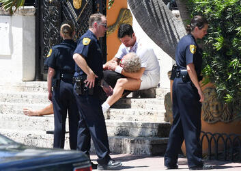 Ricky Martin and Edgar Ramirez act out the bloody death scene on the steps of the Versace Mansion during filming of Versace American Crime Story Ricky Martin and Edgar Ramirez act out the bloody death scene on the steps of the Versace Mansion during filming of Versace American Crime Story