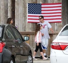 Adam Sandler Takes The Family To Surf Shop On Labor Day Adam Sandler Takes The Family To Surf Shop On Labor Day