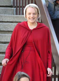 EXCLUSIVE Elisabeth Moss in Costume as Offred in The Handmaid s Tale Filming in Toronto.