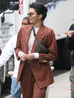 Kendall Jenner Accessorizes a Striped Suit with a Louis Vuitton Fanny Pack Kendall Jenner Accessorizes a Striped Suit with a Louis Vuitton Fanny Pack