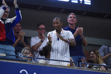 Pharrell Williams attends the US Open Pharrell Williams attends the US Open