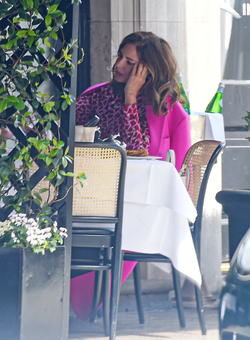Trinny Woodall smokes outside at Scotts