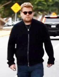 James Corden was spotted in Brentwood climbing into his Aston Martin Rapide sportscar.
