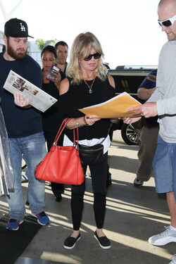 Kurt Russell and Goldie Hawn are seen at LAX Kurt Russell and Goldie Hawn are seen at LAX