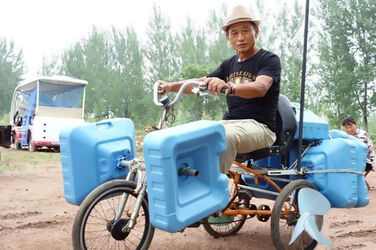 Farmer Builds Bizarre Amphibious Trike