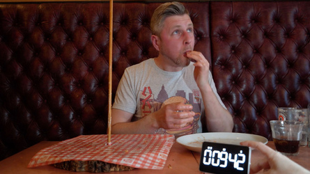 Foodie Smashes Record For Huge Burger Tower Challenge Foodie Smashes Record For Huge Burger Tower Challenge