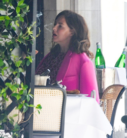 Trinny Woodall smokes outside at Scotts