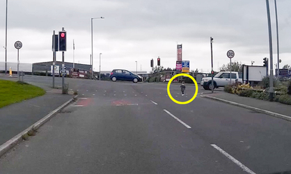 TOT RESCUED FROM ROAD