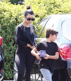 Kourtney Kardashian Is All Smiles After Treating The Kids To A Movie