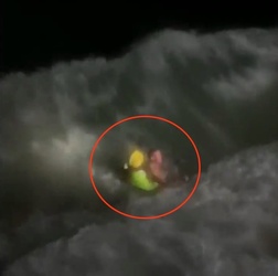 VIDEO Foolish man who went for night time swim in treacherous sea is saved by hero firefighters who dived in after him