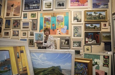 Sophie Miller of the Llewellyn Alexander gallery in Waterloo sifts through the approximately 600 works of art that has been rejected from the annual prestigious Royal Academy exhibition Sophie Miller of the Llewellyn Alexander gallery in Waterloo sifts through the approximately 600 works of art that has been rejected from the annual prestigious Royal Academy exhibition