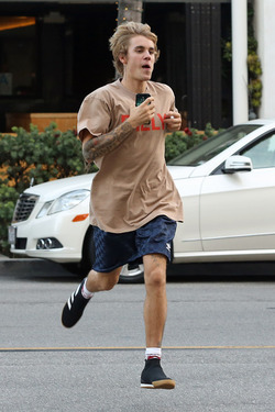 Justin Bieber Goes Jogging and Jumps as he Arrives Back at his Hotel