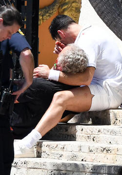 Ricky Martin and Edgar Ramirez act out the bloody death scene on the steps of the Versace Mansion during filming of Versace American Crime Story Ricky Martin and Edgar Ramirez act out the bloody death scene on the steps of the Versace Mansion during filming of Versace American Crime Story