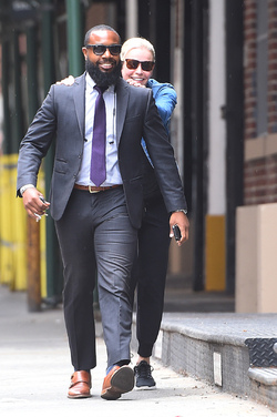 Chelsea Handler jokes with her bodyguard as she tries to keep a low profile Chelsea Handler jokes with her bodyguard as she tries to keep a low profile