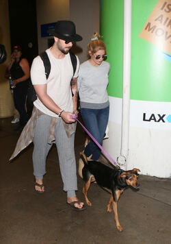 Ashley Greene and fiance take their dog on a plane