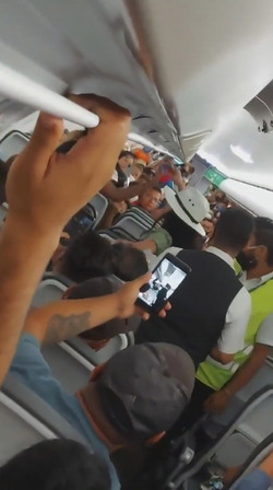 Drunk Plane Passenger Kicked Off For No Mask Rant
 Video available 