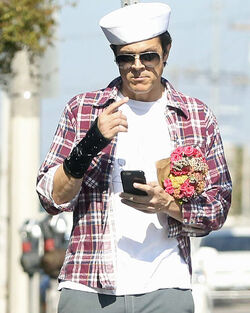 Johnny Knoxville Accesorizes with Sailor Hat and Wrist Brace