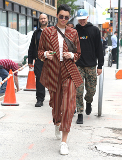Kendall Jenner Accessorizes a Striped Suit with a Louis Vuitton Fanny Pack Kendall Jenner Accessorizes a Striped Suit with a Louis Vuitton Fanny Pack