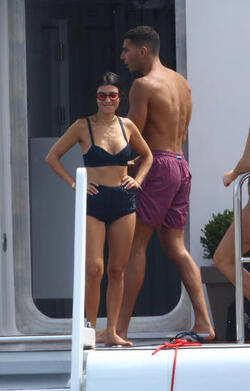 Kourtney Kardashian and boyfriend Younes Bendjima on their boat in the Bay of Cannes