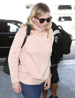 Kirsten Dunst arrives back at LAX Kirsten Dunst arrives back at LAX