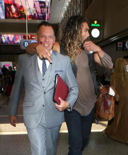 Jason Momoa Clutches His Favorite Pillow Going Through LAX TSA