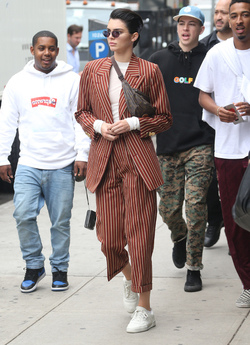 Kendall Jenner Accessorizes a Striped Suit with a Louis Vuitton Fanny Pack Kendall Jenner Accessorizes a Striped Suit with a Louis Vuitton Fanny Pack