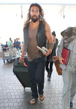 Jason Momoa Clutches His Favorite Pillow Going Through LAX TSA