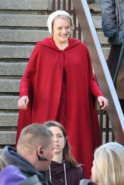 EXCLUSIVE Elisabeth Moss in Costume as Offred in The Handmaid s Tale Filming in Toronto.