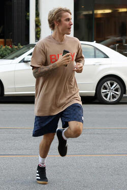 Justin Bieber Goes Jogging and Jumps as he Arrives Back at his Hotel