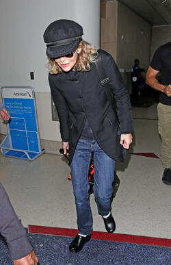 Meg Ryan Tries To Keep A Low Profile Arriving In L.A. After CFDA Awards