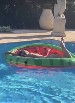 Liz Hurley poses totally nude on a slice of watermelon Liz Hurley poses totally nude on a slice of watermelon