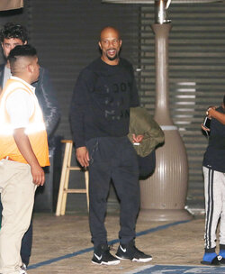 Common enjoys a night out with family at Soho
