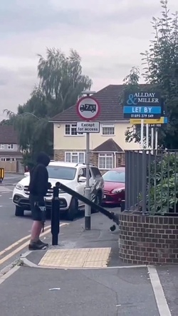 VIDEO Disgruntled masked man hacks down London ULEZ camera in broad daylight 48 hours after it was installed