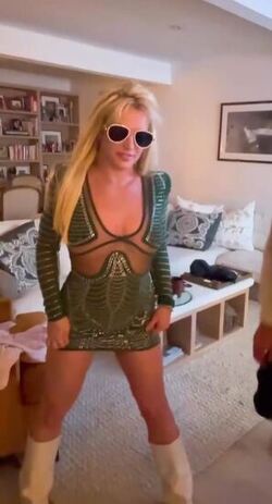 Britney Spears dances around in bed and gets licked by man Britney Spears dances around in bed and gets licked by man