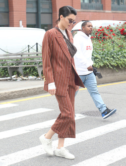 Kendall Jenner Accessorizes a Striped Suit with a Louis Vuitton Fanny Pack Kendall Jenner Accessorizes a Striped Suit with a Louis Vuitton Fanny Pack