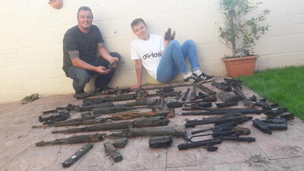 Neil Hopkins and son Billy 13 who found a suspected IRA weapons cache on the Somerset levels near their home in Bridgewater using a powerful magnet in King Sedgemores drain at Greylake. Neil Hopkins and son Billy 13 who found a suspected IRA weapons cache on the Somerset levels near their home in Bridgewater using a powerful magnet in King Sedgemores drain at Greylake.