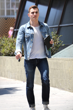 Dave Franco with tablet and bottled drink seen out in Los Angeles Dave Franco with tablet and bottled drink seen out in Los Angeles