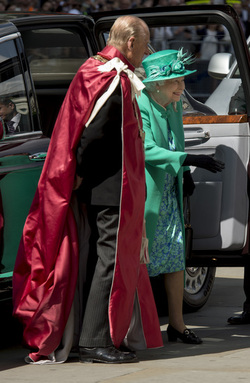 Queen Elizabeth II and Prince Philip Duke of Edinburgh attend a service to mark the 100th anniversary of the Order of the British Empire at St Paul s Cathedral in London.