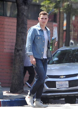 Dave Franco with tablet and bottled drink seen out in Los Angeles Dave Franco with tablet and bottled drink seen out in Los Angeles